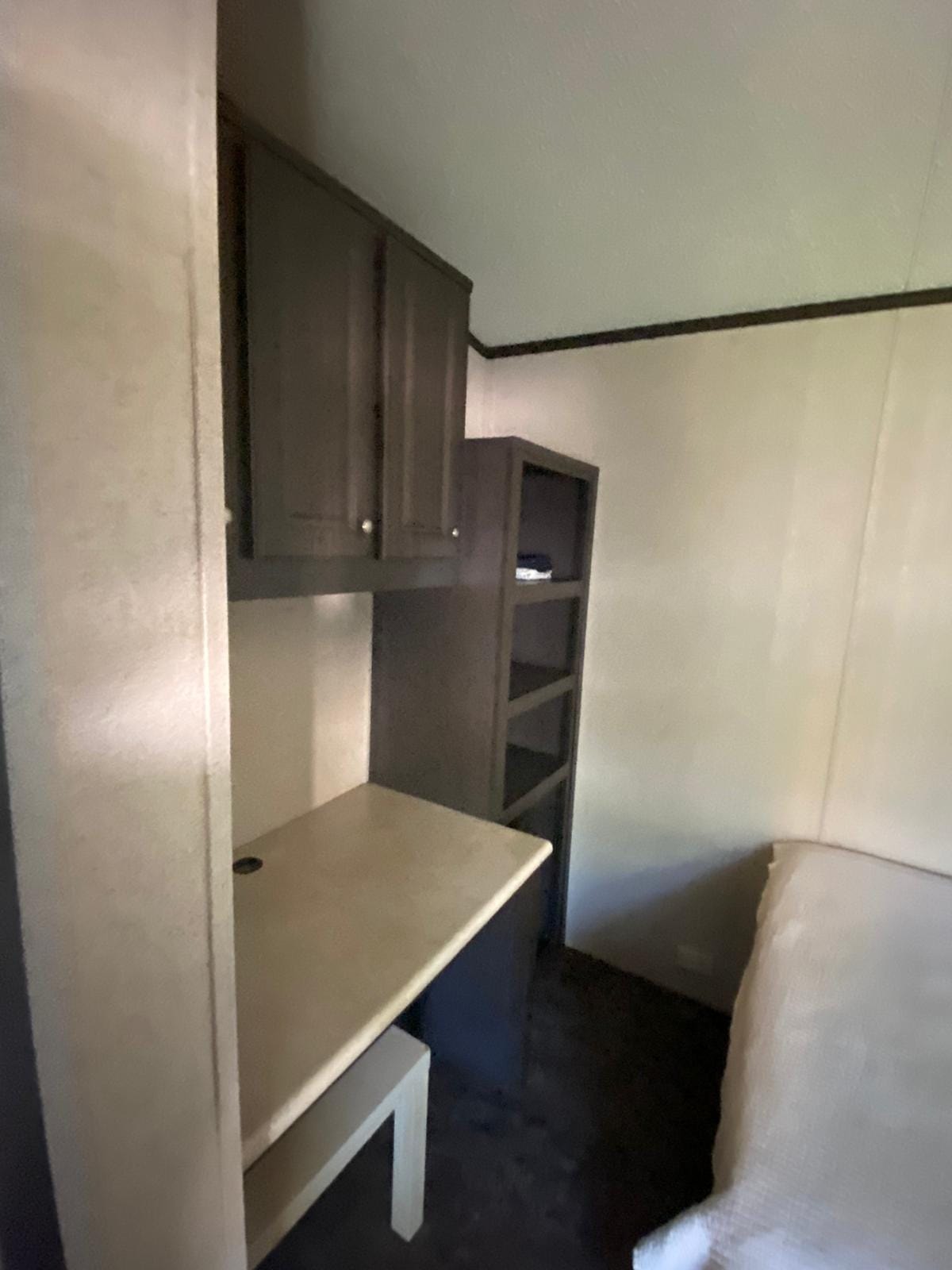 Studio desk and shelving storage