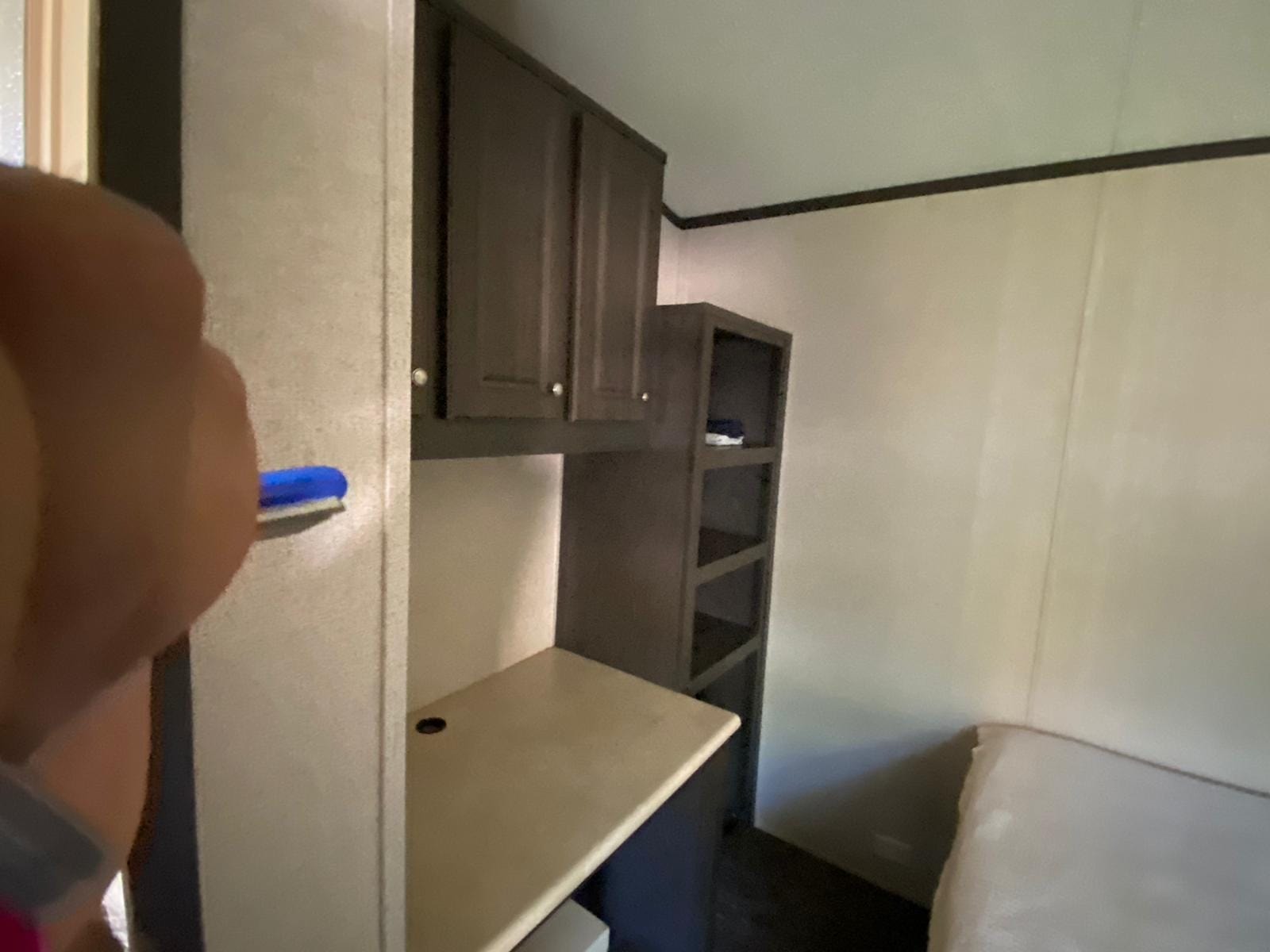 Studio built-in desk and cabinet storage
